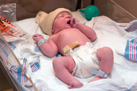 Newborn baby resting in hospital's post-delivery room