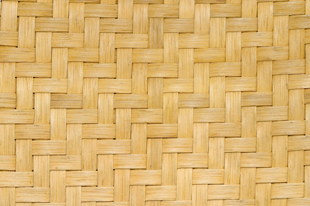 Close-up of cane weaving of chair seat