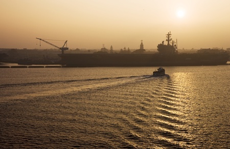 View from Cruise ship leaving from San Diego, California as sun is settingの写真素材