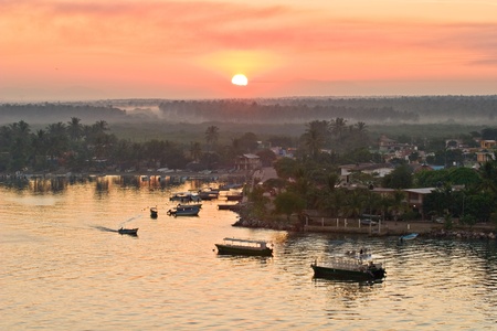 Sailing into Mazatlan harbor during early morning sunriseの写真素材