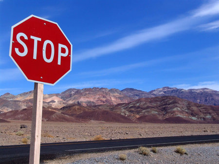 Highway in Death Valley, Artist Palette is on backgroundの写真素材
