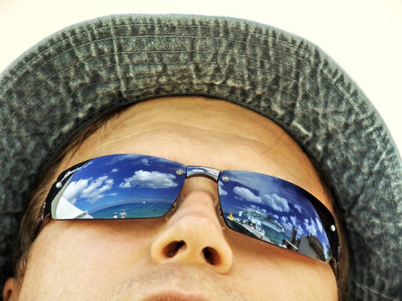Blue Caribbean Seascape reflected in sun glasses