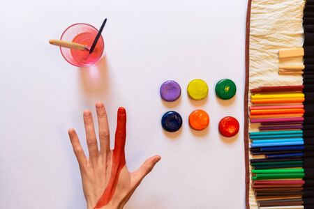 Stock photo of a caucasian person water painting on their hands.の写真素材
