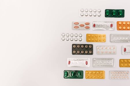 Stock photo of a bunch of tablets in blister packaging placed in order. There is nobody on the picture.の写真素材