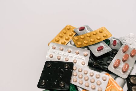 Stock photo of a bunch of tablets in colored blister packaging. There is nobody on the picture.の写真素材