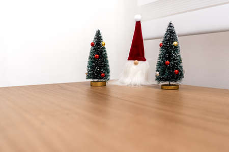 Stock photo of cute christmas decoration placed in wooden table.の写真素材