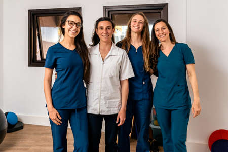 Stock photo of united work team of happy women in physiotherapy clinic.の写真素材