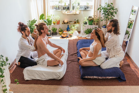 Stock photo of pregnant woman and her partner receiving relaxing massage.の写真素材