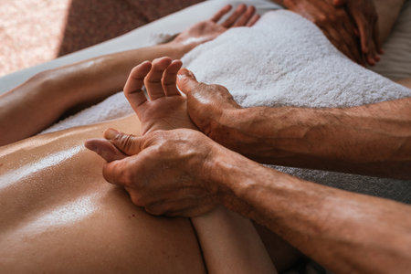 Stock photo of unrecognized person enjoying hand massage in spa.の写真素材