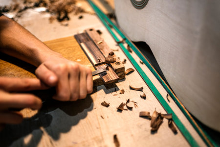 Unrecognized luthier woman in traditional workshop