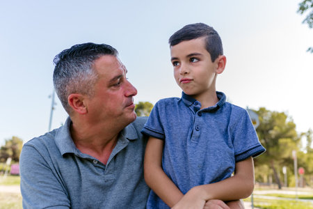 Family of father and son outdoorsの写真素材