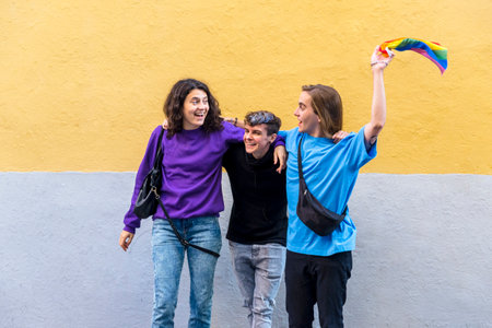 Young diverse friends talking outdoors on the street.の写真素材
