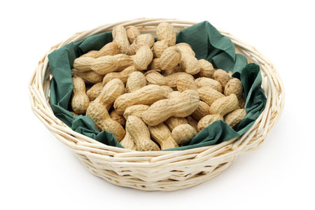 peanuts in basket isolated on white background