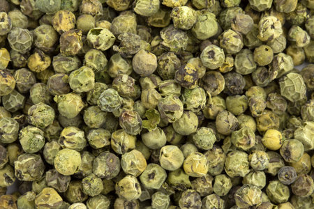 close up of a background of green peppercornsの写真素材