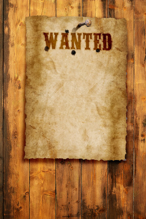 wild west wanted poster on wooden wallの写真素材