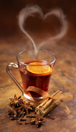  glass of mulled wine, cinnamon sticks and star aniseの写真素材