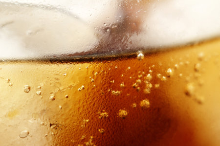  close up of an iced glass of coke の写真素材