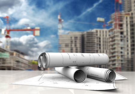 technical blueprints on white table in a construction siteの写真素材