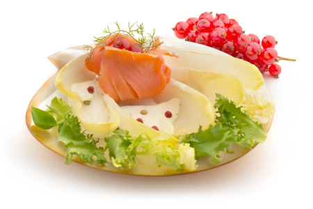 smoked salmon, chicory salad and cream sauceの写真素材
