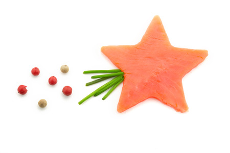 smoked salmon star-shaped, chives and peppercornsの写真素材