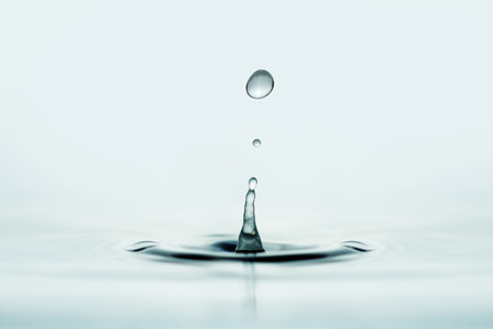 close up of water drop over wet surfaceの写真素材
