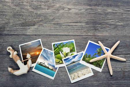 seaside snapshots, anchor and starfish on wooden backgroundの写真素材