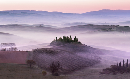 scenic view of a rosy dawn on the hillsの写真素材
