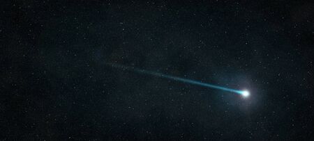 Shooting star that shines in the starry night skyの写真素材