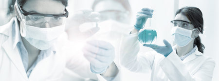Multiple exposure of female chemist working in research lab