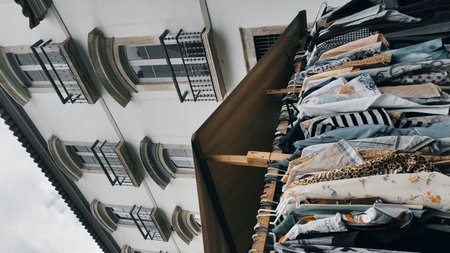 Clothes hanging on a clothesline in a market in Rio de Janeiro, Brazilの写真素材