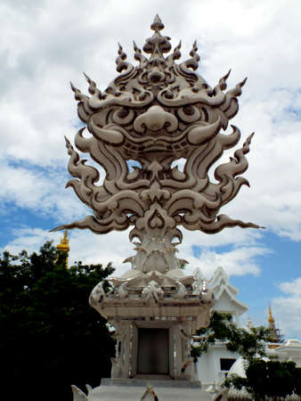 Chiang Rai. Thailand, June 17, 2017: Wat Rong Khun. One of the many sculptures in the White Temple in Chiang Rai, Thailand. Designed by Don Chalermchai Kositpipatのeditorial素材