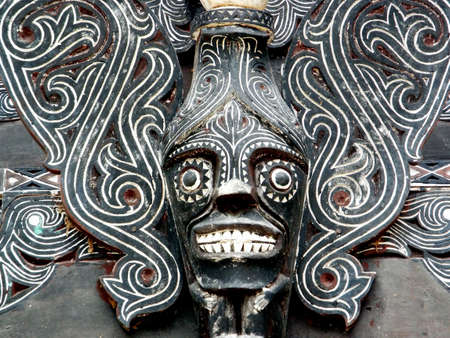 Pulau Samosir, Lake Toba, Sumatra, Indonesia, January 12, 2018: Close-up of the typical ornate decoration of a traditional wooden house on Lake Toba, Pulau Samosir. Indonesiaのeditorial素材
