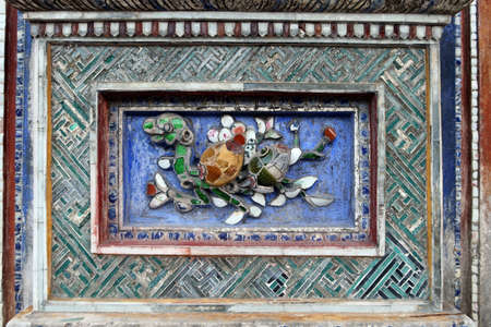 Hue, Vietnam, July 14, 2020: Colorful decoration of the east gate of the Hue Citadel. Vietnamのeditorial素材