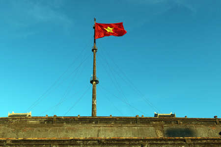 Hue, Vietnam, July 14, 2020: Flag of Vietnam at the Hue Citadel. Vietnamのeditorial素材
