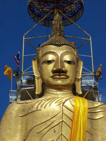 Bangkok, Thailand, September 9, 2015: The face of the 32 meter tall Buddha at Wat Intharawihan in Bangkok, Thailandのeditorial素材