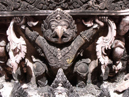 Bangkok, Thailand, September 9, 2015: Detail of a small stone stupa at Wat Intharawihan in Bangkok, Thailandのeditorial素材