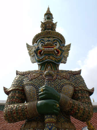 Bangkok, Thailand, January 25, 2013: Sculpture of a warrior holding a sword at the Royal Palace in Bangkokのeditorial素材