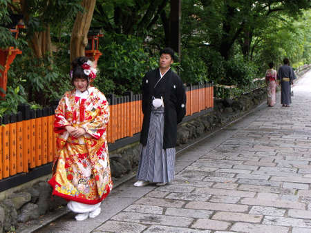 Kyoto, Japan, July 13, 2016: Japanese dressed in traditional kimono on a street in Kyotoのeditorial素材