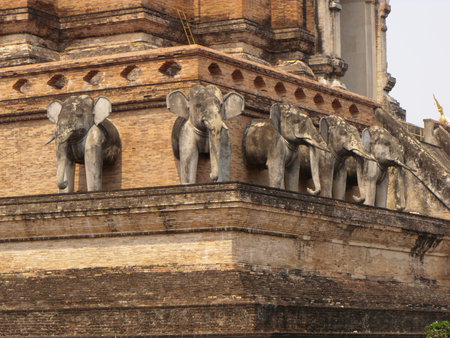 Chiang Mai, Thailand, April 25, 2016: Sculptures of elephants in the Wat Chedi Luang stupa in Chiang Maiのeditorial素材