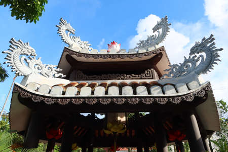 Hoi An, Vietnam, September 22, 2021: Two-tiered roof on a pagoda in the gardens of Nam Ton Templeのeditorial素材