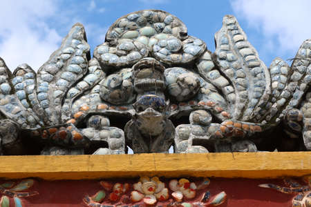 Hoi An, Vietnam, October 10, 2021: Detail of the sculpture above the entrance door of the Hy Hoa temple in Hoi An, Vietnamのeditorial素材