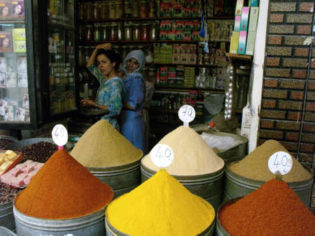 Marrakech, Morocco, August 13, 2012: Two women inside a shop in Marrakech. Moroccoのeditorial素材
