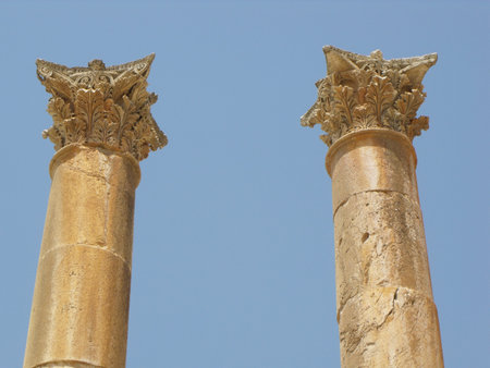 Jerash, Jordan, August 8, 2010: Detail of the capitals of two columns in the Roman city of Jerash,...