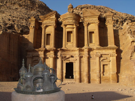 Petra, Jordan. August 16, 2010: Metal teapots in front of the facade of the Monastery on the mountain of Petra, Jordanのeditorial素材