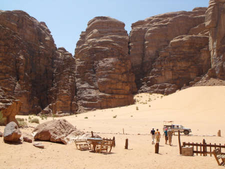 Wadi Rum desert, Jordan, August 15, 2010: Group of tourists drive to an off-road car in Wadi Rum desert, Jordanのeditorial素材