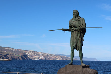 Candelaria, Tenerife, Canary Islands, Spain, March 8, 2022: Sculpture of the Guanche king Anaterve next to the Atlantic Ocean in Candelaria, Tenerife, Spainのeditorial素材