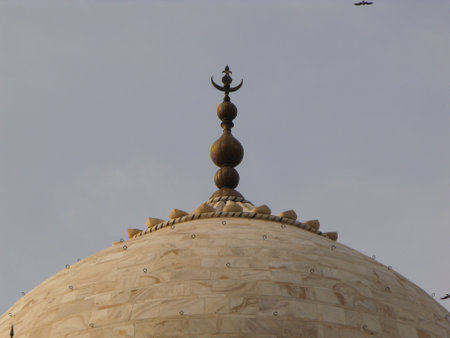 Taj Mahal, Agra, India, August 18, 2011: Highest point of the dome of the white marble mausoleum of the Taj Mahalのeditorial素材