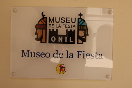 Onil, Alicante, Spain, August 8, 2025: Poster depicting a Moor and a Christian at the entrance to the Onil Festival Museum, Alicante, Spainの写真素材