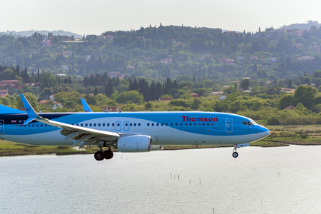 CORFU, GREECE - May 13, 2016: Aircraft Boeing 737-800 landing at Corfu International Airport. Corfu Island, Greeceのeditorial素材