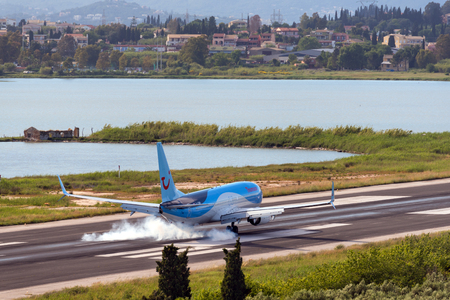 CORFU, GREECE - May 13, 2016: Aircraft Boeing 737-800 landing at Corfu International Airport. Corfu Island, Greeceのeditorial素材